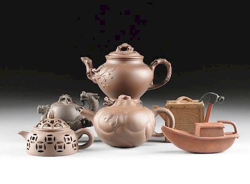 A GROUP OF SIX UNUSUAL YIXING EARTHENWARE 381cb9