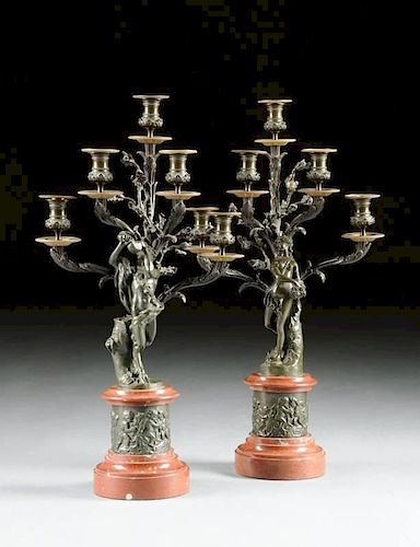 A PAIR OF LOUIS XVI STYLE PATINATED