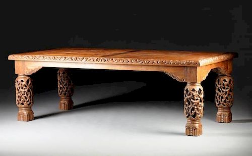 A SPANISH COLONIAL STYLE CARVED OAK