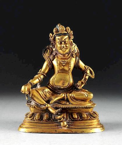 A SINO-TIBETAN GILT BRONZE FIGURE