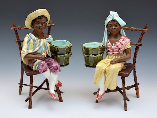 PAIR OF SEATED WEST INDIES FIGURES 381e41