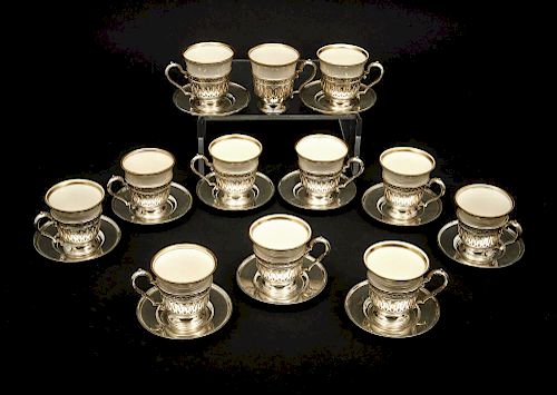 STERLING DEMITASSE CUPS AND SAUCERS  382350