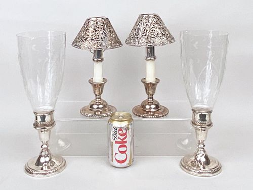 TWO PAIR WEIGHTED STERLING CANDLESTICKSone