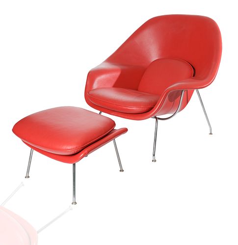 A SAARINEN RED 'WOMB CHAIR' AND
