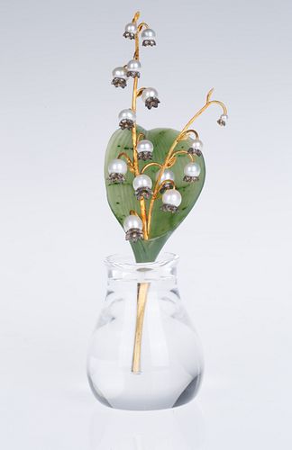 A FABERGE-STYLE FLOWER STUDYset in a