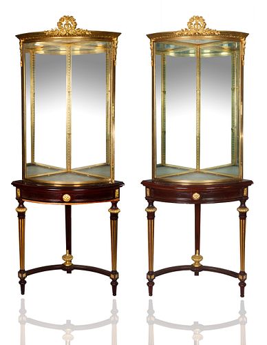 A PAIR OF FRENCH CURIO CABINETSeach
