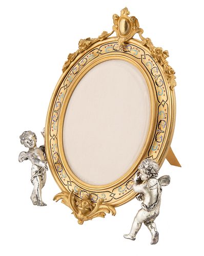 AN ORMOLU AND ENAMEL PICTURE FRAME,