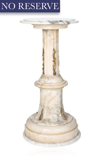 A FLUTED WHITE MARBLE PEDESTAL,