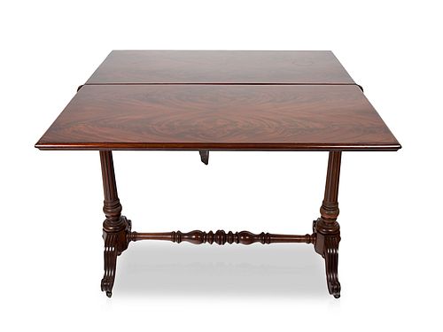 A WOODEN DINING TABLE, 19TH CENTURYA