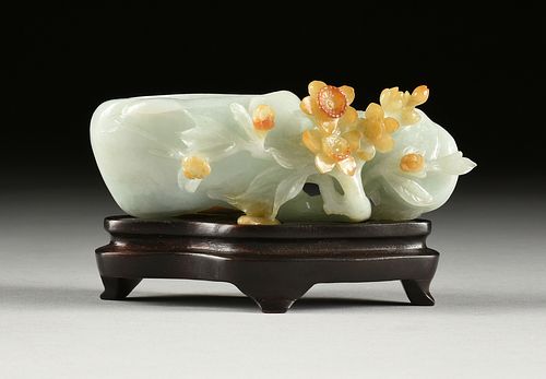 A CHINESE CELADON AND RUSSET JADE