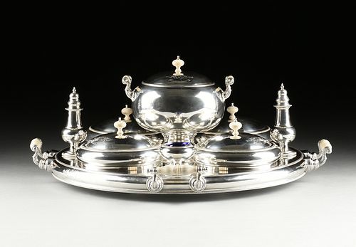 AN ENGLISH SILVERPLATED LAZY SUSAN SUPPER