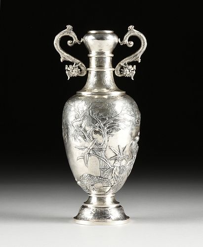 A CHINESE EXPORT SILVER TWO-HANDLED