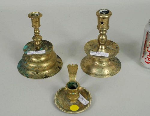 THREE EARLY BRASS CANDLESTICKS Three 3838d2