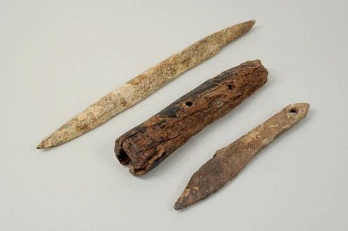 THREE INUIT FOSSILIZED HUNTING