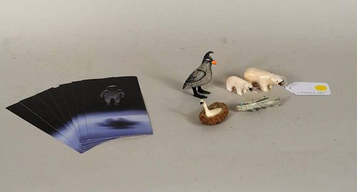 FOUR INUIT CARVED WALRUS IVORY