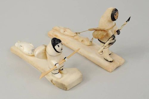 TWO INUIT WALRUS IVORY & BONE SCRIMSHAW