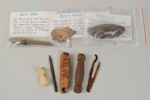EIGHT INUIT CARVED FOSSILIZED &