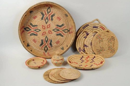 TWELVE INUIT GRASS & REED BASKETS