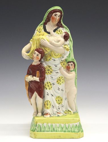 STAFFORDSHIRE FIGURE OF CHARITYAn