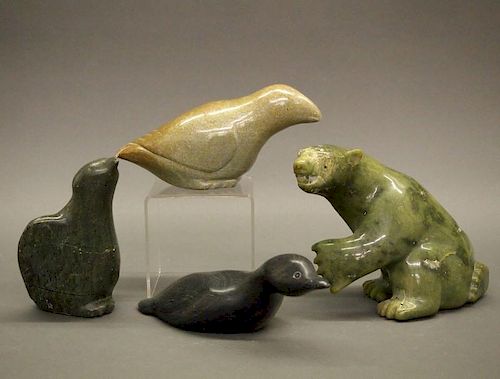 4 INUIT STONE CARVINGSFour Inuit 384a55