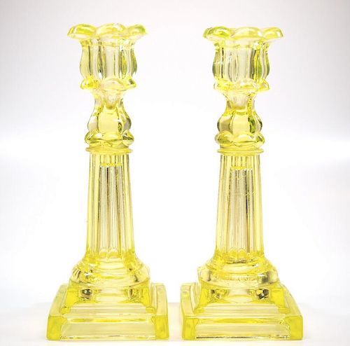 PRESSED PETAL & COLUMNAR CANDLESTICKS,