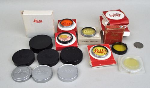 GROUP OF LEICA LENS CAPS & ACCESSORIESincluding