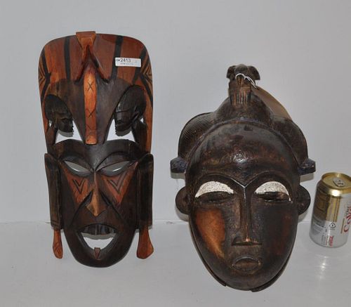 TWO CARVED WOOD AFRICAN MASKSLargest: