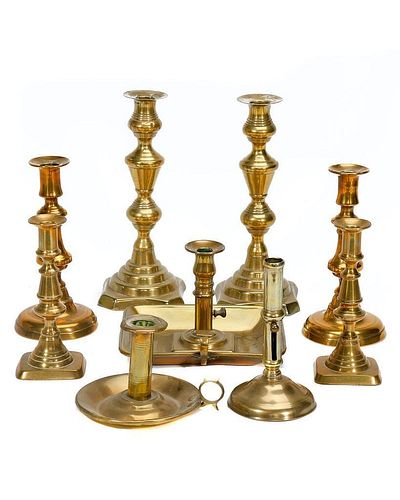 GROUP OF NINE BRASS CANDLESTICKS.19th