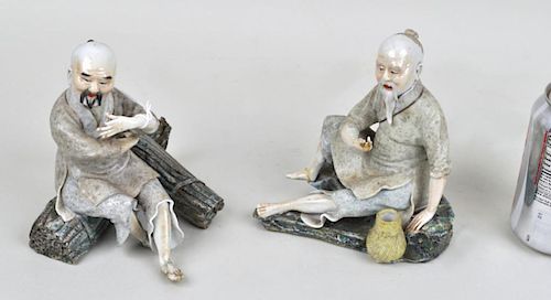 TWO ASIAN PORCELAIN SEATED FIGURESboth