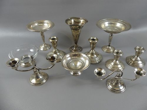 11 PIECES WEIGHTED SILVER - CANDLESTICKS