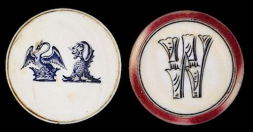 TWO SCRIMSHAWED IVORY POKER CHIPS.Two