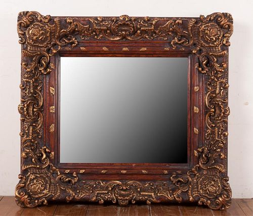 ORNATE GILDED MIRRORWith beveled glass;