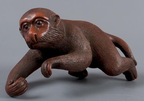 CERAMIC MONKEY SCULPTURE, SIGNEDWith