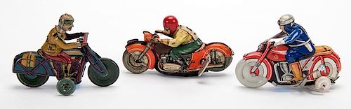 GROUP OF THREE VINTAGE WIND-UP MOTORCYCLESGroup