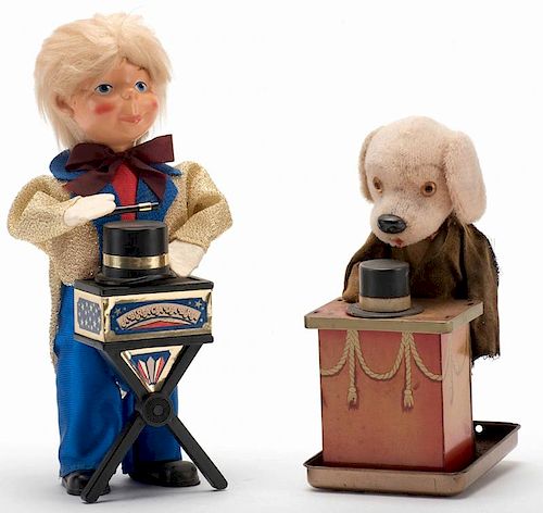 TWO VINTAGE WIND-UP MAGICIAN TOYS.