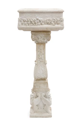 A CLASSICAL STYLE CARVED MARBLE