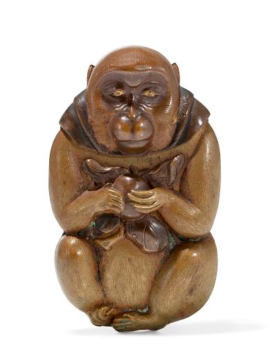 A JAPANESE MONKEY FORM MATCH SAFE/FLINT