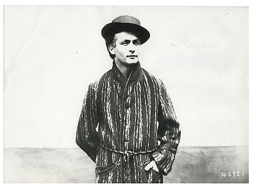 TWO PHOTOGRAPHS OF HOUDINI.Houdini,