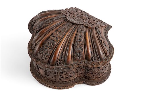 A SPANISH COLONIAL CARVED COQUERA (COCA