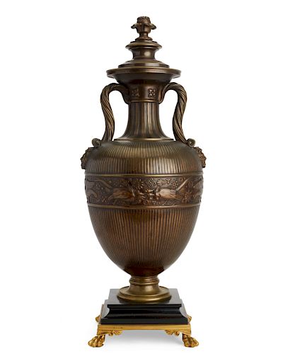 A CONTINENTAL BRONZE URN NOW AS