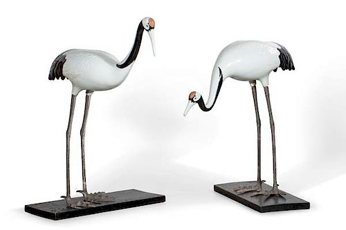 A PAIR OF PORCELAIN AND METAL STANDING