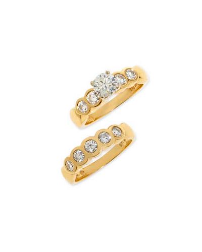 A DIAMOND AND FOURTEEN KARAT GOLD 385449