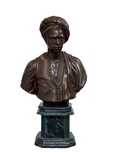 A PATINATED BRONZE BUST OF A MOOR
