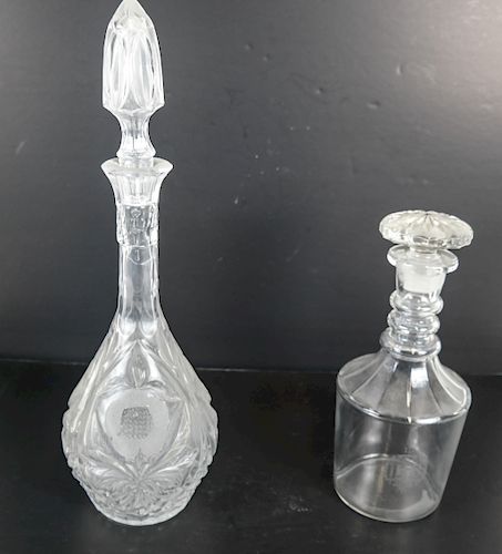 PAIR OF GLASS DECANTERS1 A square 38833c