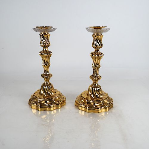 TWO ROCOCO-STYLE BRASS CANDLESTICKSTwo