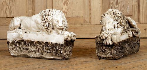 PAIR CARVED COMPOSITE LION FIGURESA