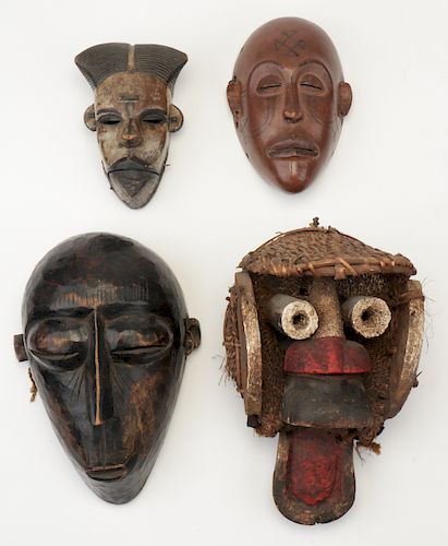 GROUP OF FOUR AFRICAN MASKSGroup 38af2a