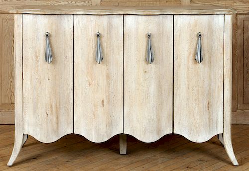 OAK FOUR DOOR CABINET IN THE MANNER