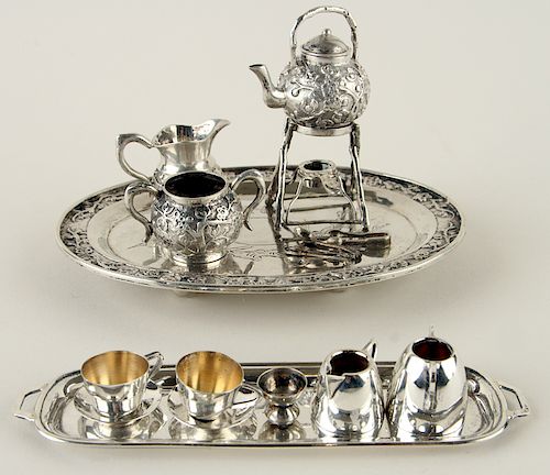 TWO SILVER MINIATURE TEA SERVICES 38b3ea