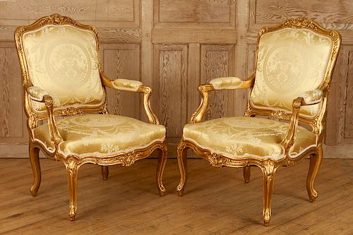 PAIR GILT CARVED OPEN ARM CHAIRS 38b980